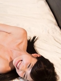 Hairy pussy hottie Shino Aoi gets eagerly finger-blasted while chilling on a bed