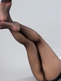 Nerdy redhead with glasses Chie Kobayashi giving a great footjob in a POV gallery
