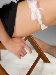 Garter-wearing hottie Madoka Yukishiro gives a very lazy footjob to a guy