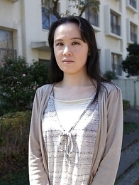 Junko Nishimura is an Asian lady presenting