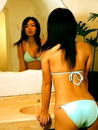 hottie Yukie Kawamura has her big plump breasts wrapped in a bikini