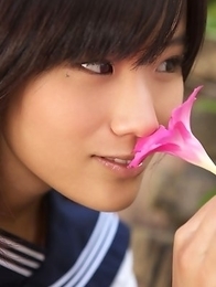 Japan teen Yuzuki Hashimoto in sailor gal uniform is playful outdoor