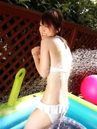 Japanese Naoko Sawano enjoys some water on sexy curves in hot day
