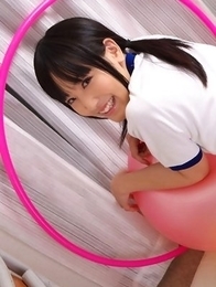 Yuri Hamada in sports equipment plays with balloons a lot