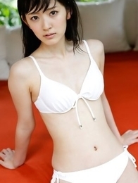 Airi Suzuki in bath suit enjoys petals all over her body