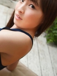 Maho Kiruma shows sexy curves in bath suit in her garden